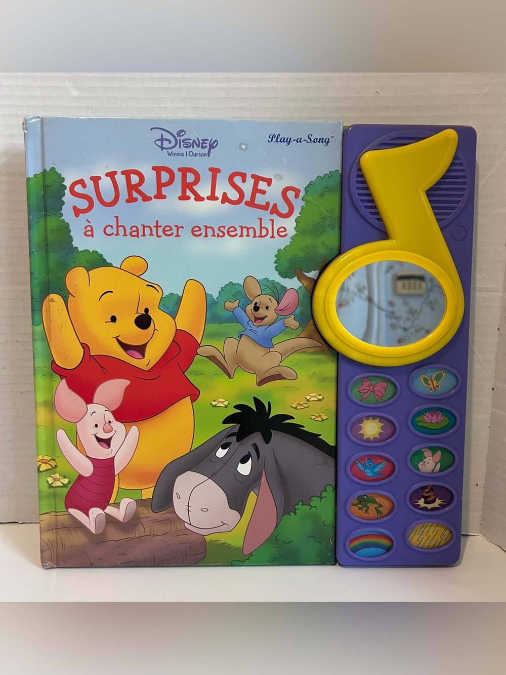 Disney Winnie the Pooh Surprise play-a-Song singalong book. **French**